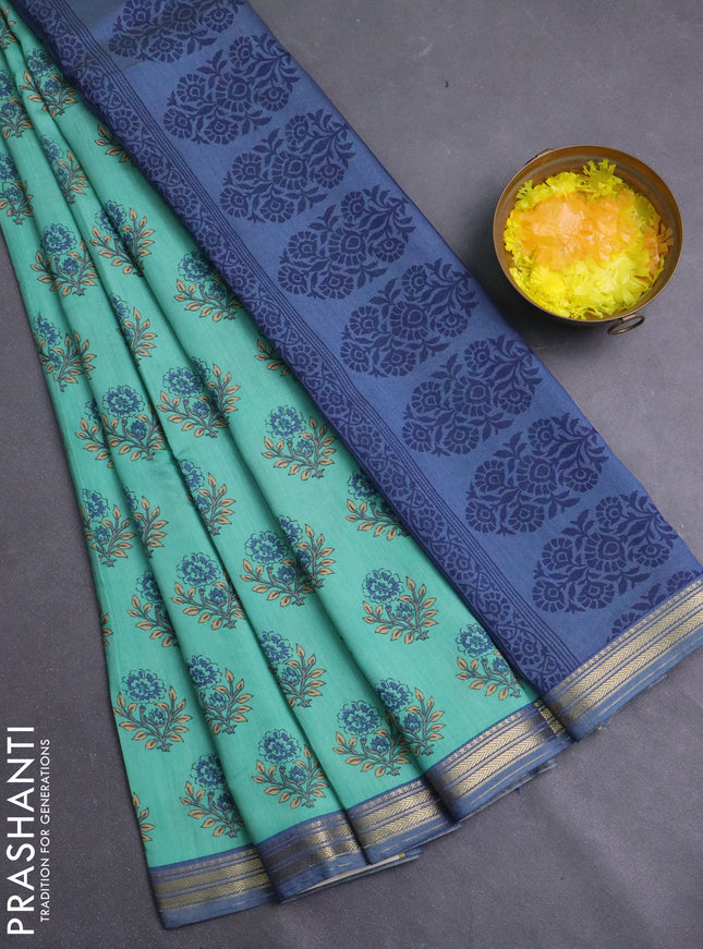 Muslin silk saree teal green and blue shade with allover floral butta prints and zari woven border