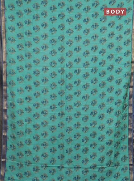 Muslin silk saree teal green and blue shade with allover floral butta prints and zari woven border