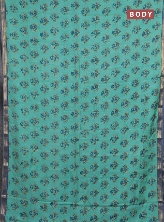Muslin silk saree teal green and blue shade with allover floral butta prints and zari woven border