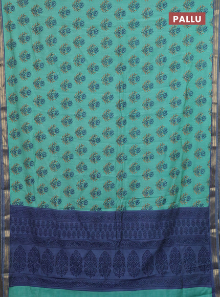 Muslin silk saree teal green and blue shade with allover floral butta prints and zari woven border