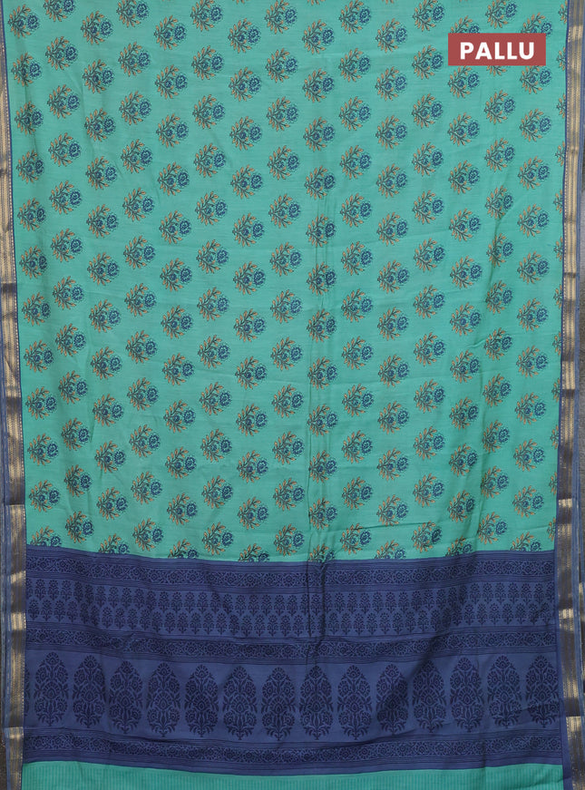 Muslin silk saree teal green and blue shade with allover floral butta prints and zari woven border