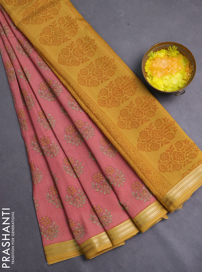 Muslin silk saree peach shade and mustard yellow with allover floral butta prints and zari woven border