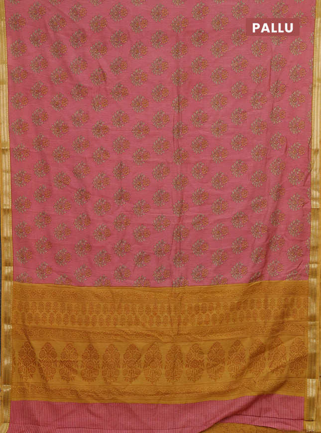 Muslin silk saree peach shade and mustard yellow with allover floral butta prints and zari woven border
