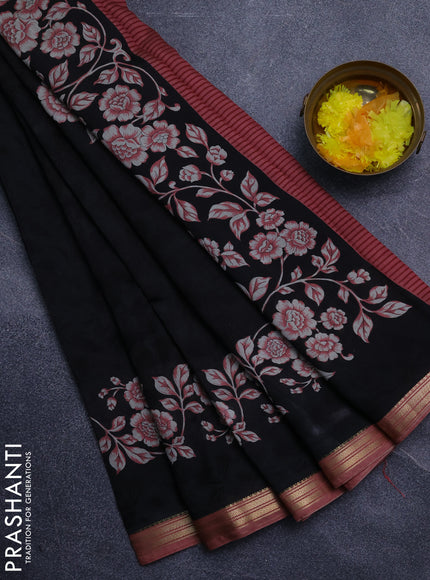 Muslin silk saree black and peach shade with allover floral prints and zari woven border