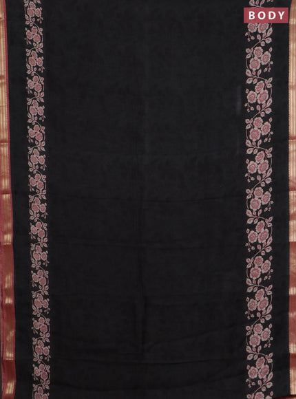 Muslin silk saree black and peach shade with allover floral prints and zari woven border