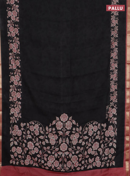 Muslin silk saree black and peach shade with allover floral prints and zari woven border