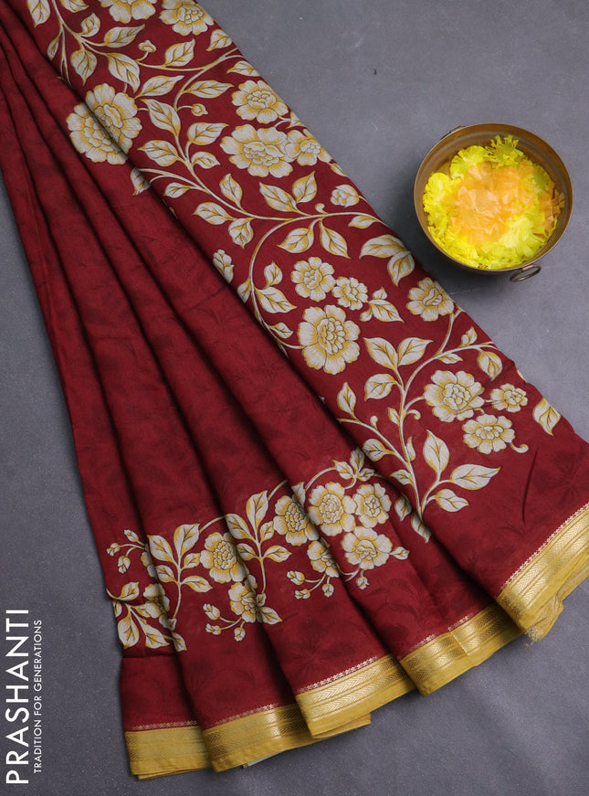 Muslin silk saree maroon and mustard yellow with allover floral prints and zari woven border