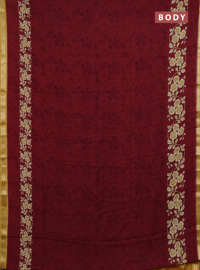 Muslin silk saree maroon and mustard yellow with allover floral prints and zari woven border