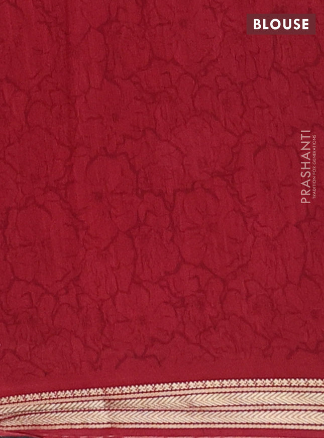 Muslin silk saree black and maroon with allover geometric prints and zari woven border