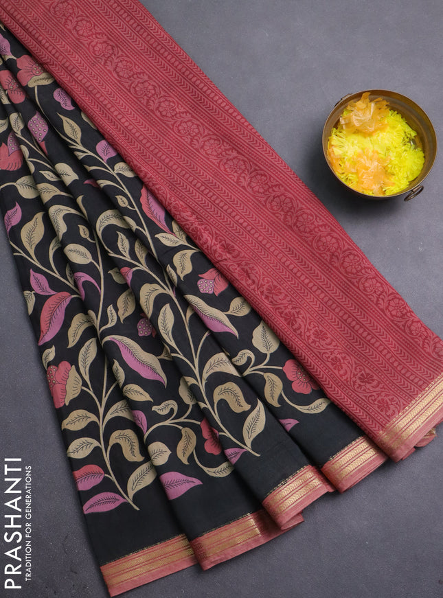 Muslin silk saree black and dark peach with allover floral prints and zari woven border
