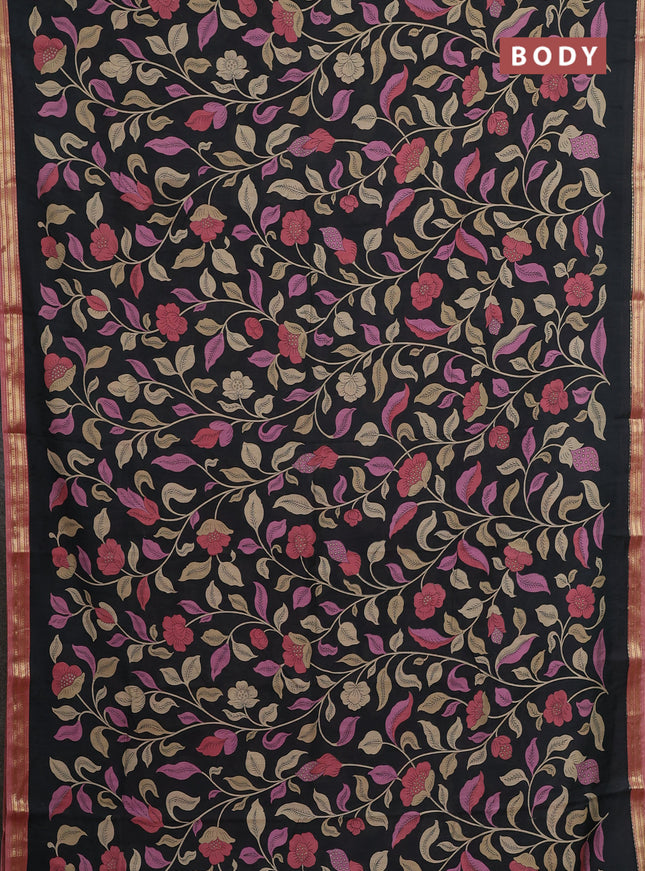 Muslin silk saree black and dark peach with allover floral prints and zari woven border