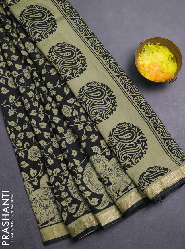 Muslin silk saree black and elaichi green with allover kalamkari prints and zari woven border