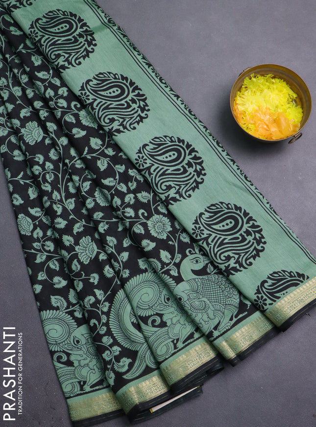 Muslin silk saree black and pastel green with allover kalamkari prints and zari woven border