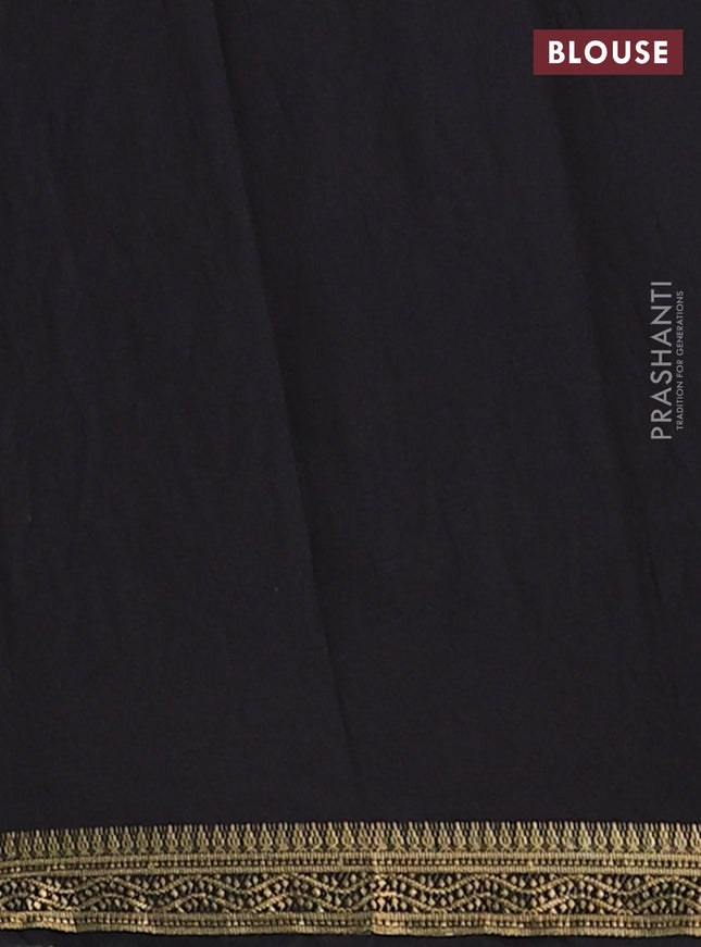 Muslin silk saree black and pastel green with allover kalamkari prints and zari woven border
