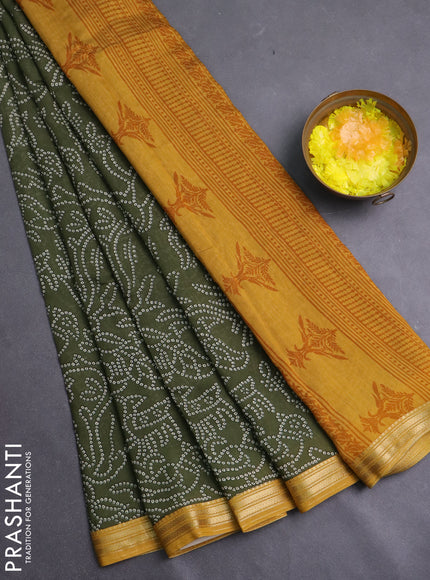 Muslin silk saree sap green and mustard yellow with allover bandhani prints and zari woven border