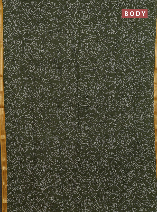 Muslin silk saree sap green and mustard yellow with allover bandhani prints and zari woven border