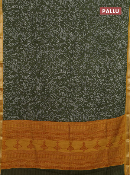 Muslin silk saree sap green and mustard yellow with allover bandhani prints and zari woven border