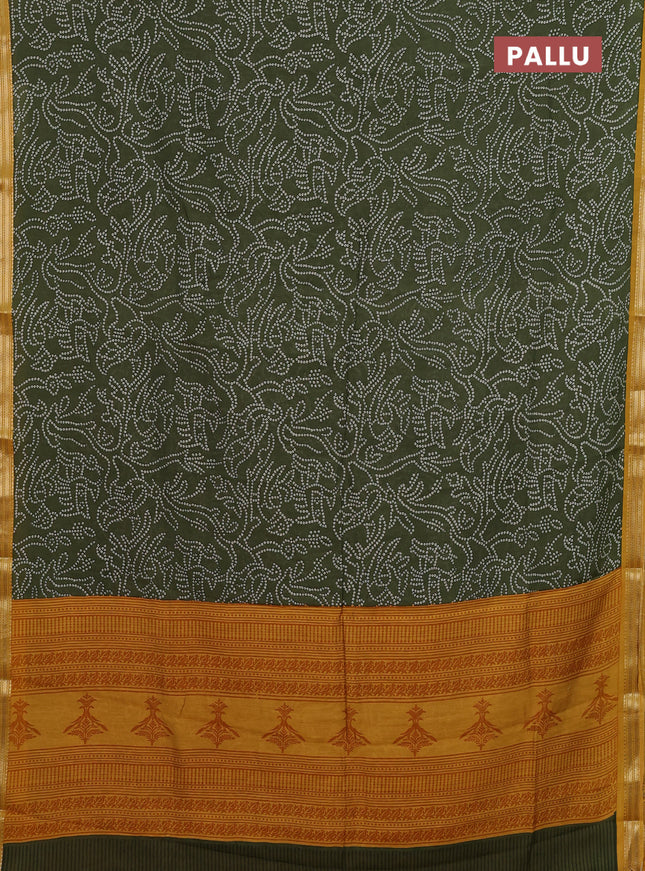 Muslin silk saree sap green and mustard yellow with allover bandhani prints and zari woven border