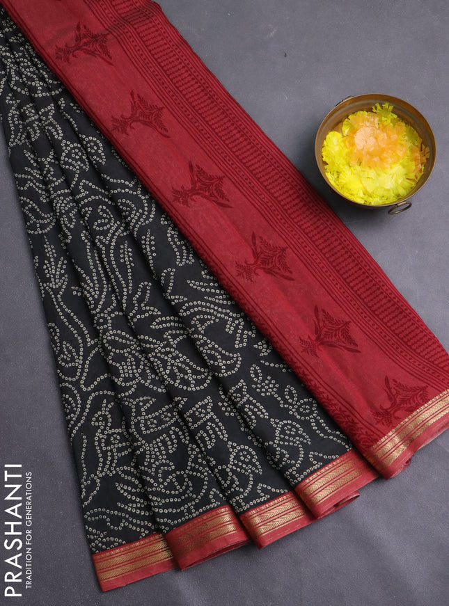 Muslin silk saree black and maroon with allover bandhani prints and zari woven border