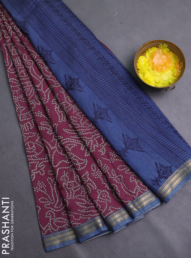 Muslin silk saree maroon and blue shade with allover bandhani prints and zari woven border