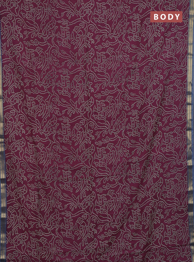 Muslin silk saree maroon and blue shade with allover bandhani prints and zari woven border