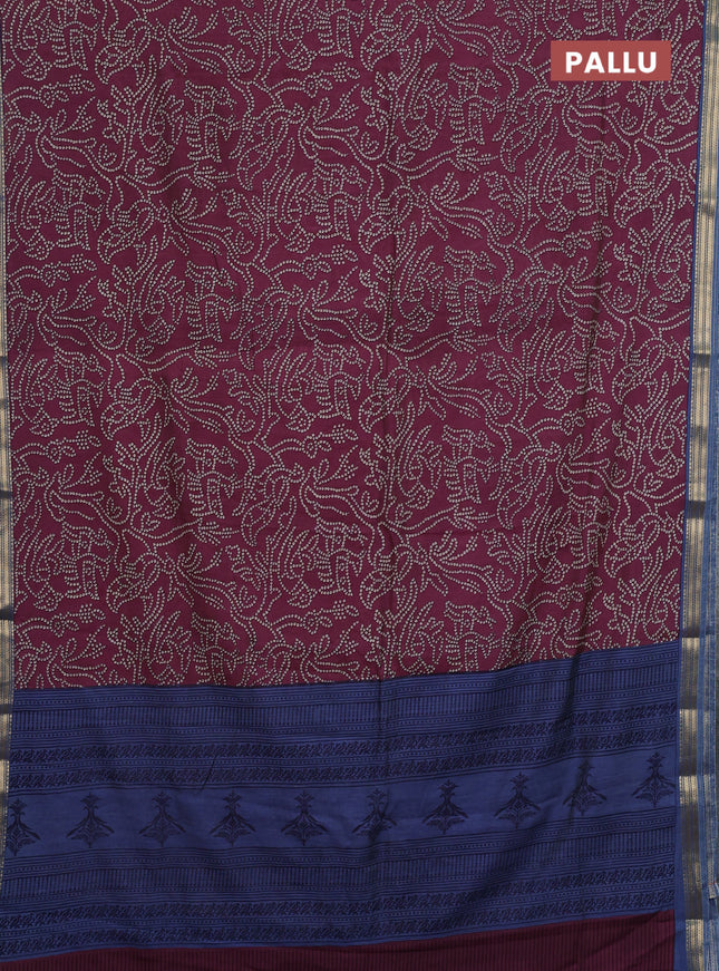 Muslin silk saree maroon and blue shade with allover bandhani prints and zari woven border