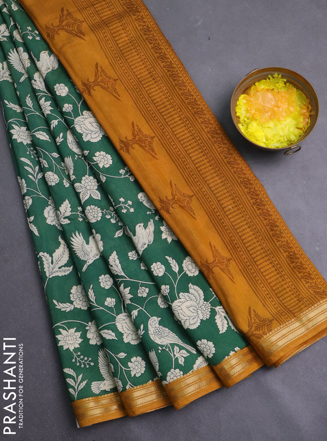Muslin silk saree green and mustard yellow with allover prints and zari woven border