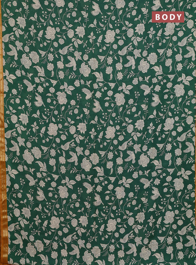 Muslin silk saree green and mustard yellow with allover prints and zari woven border