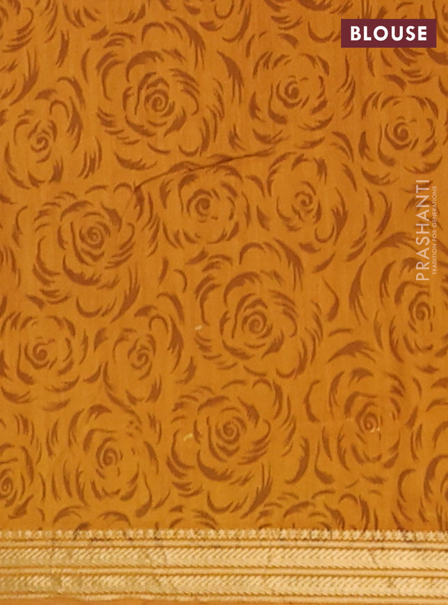 Muslin silk saree green and mustard yellow with allover prints and zari woven border