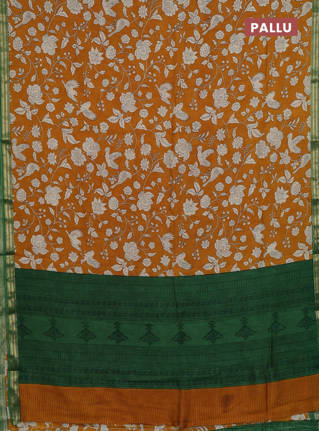 Muslin silk saree mustard yellow and green with allover prints and zari woven border
