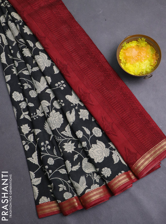 Muslin silk saree black and maroon with allover prints and zari woven border