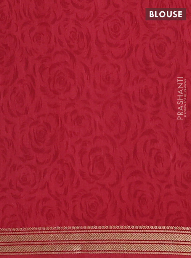 Muslin silk saree black and maroon with allover prints and zari woven border