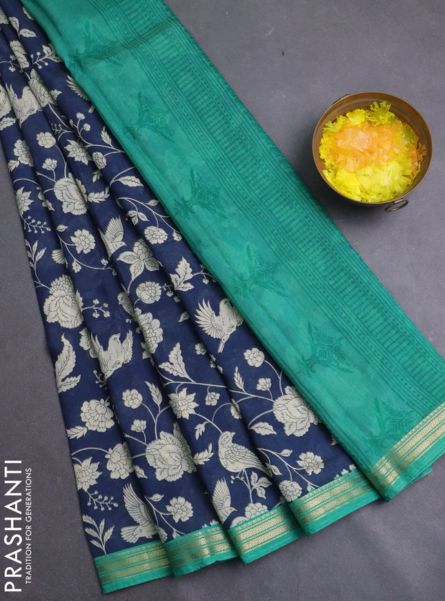 Muslin silk saree navy blue and teal green with allover prints and zari woven border