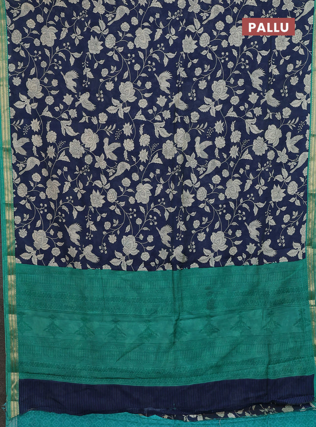 Muslin silk saree navy blue and teal green with allover prints and zari woven border