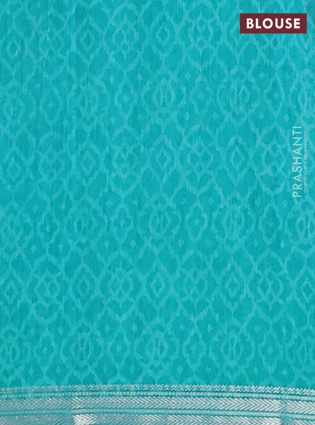 Muslin silk saree navy blue and teal green with allover prints and zari woven border