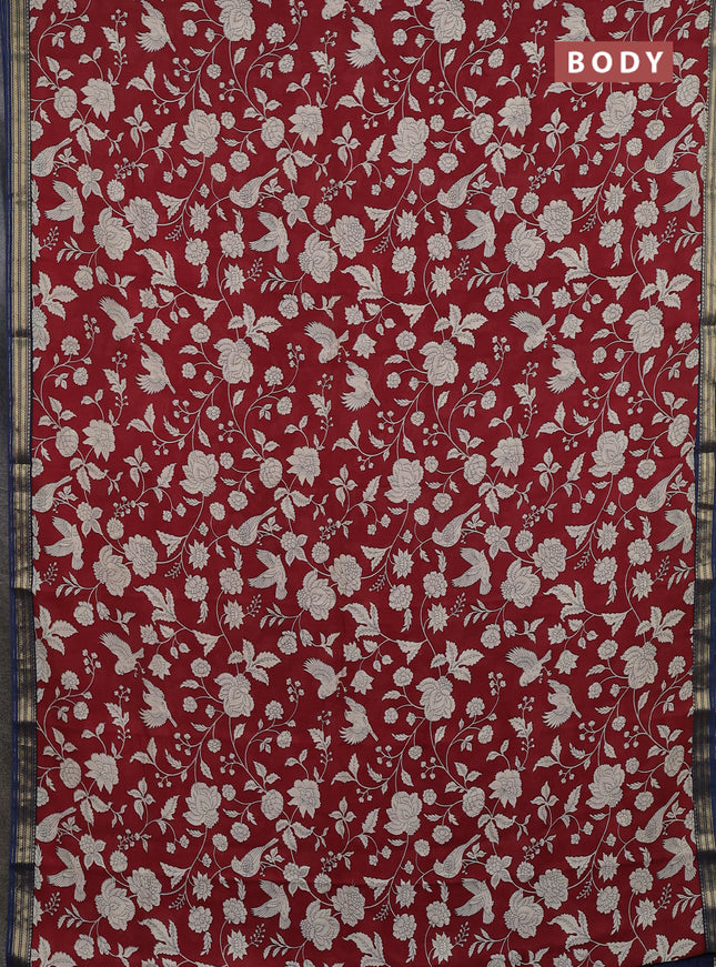 Muslin silk saree maroon and blue with allover prints and zari woven border