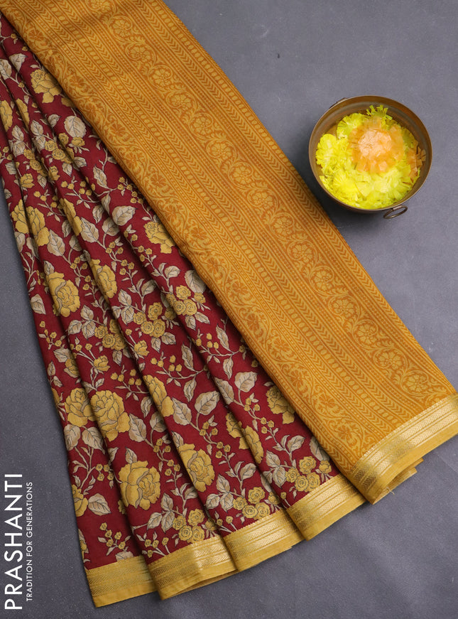 Muslin silk saree maroon and mustard yellow with allover floral prints and zari woven border