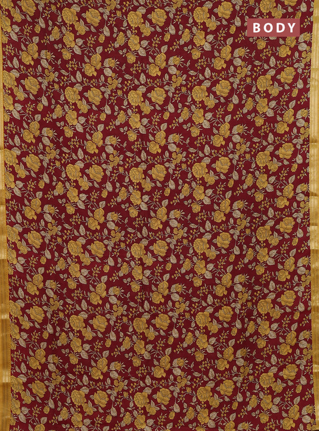 Muslin silk saree maroon and mustard yellow with allover floral prints and zari woven border