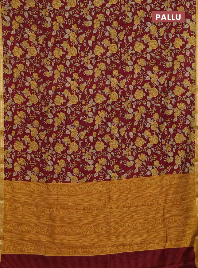 Muslin silk saree maroon and mustard yellow with allover floral prints and zari woven border