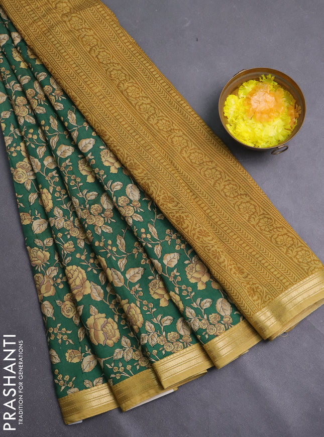 Muslin silk saree green and mustard yellow with allover floral prints and zari woven border