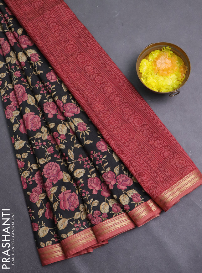 Muslin silk saree black and peach shade with allover floral prints and zari woven border
