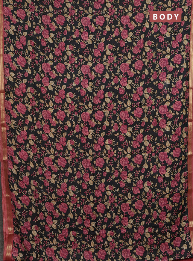 Muslin silk saree black and peach shade with allover floral prints and zari woven border