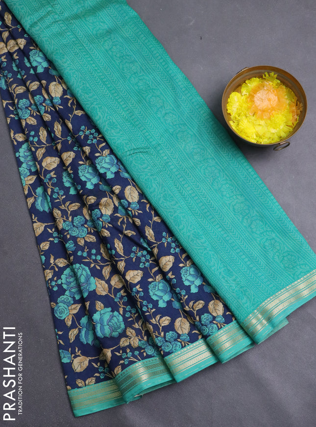 Muslin silk saree navy blue and teal green with allover floral prints and zari woven border