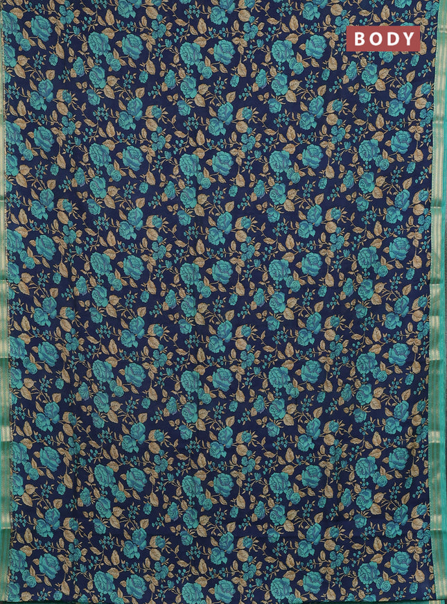 Muslin silk saree navy blue and teal green with allover floral prints and zari woven border