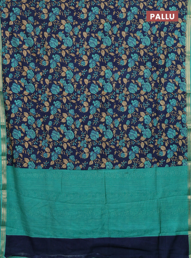 Muslin silk saree navy blue and teal green with allover floral prints and zari woven border