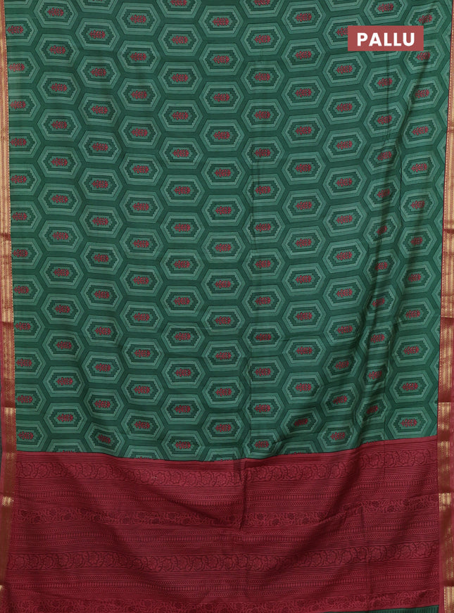 Muslin silk saree green and dark peach with allover geometric prints and zari woven border