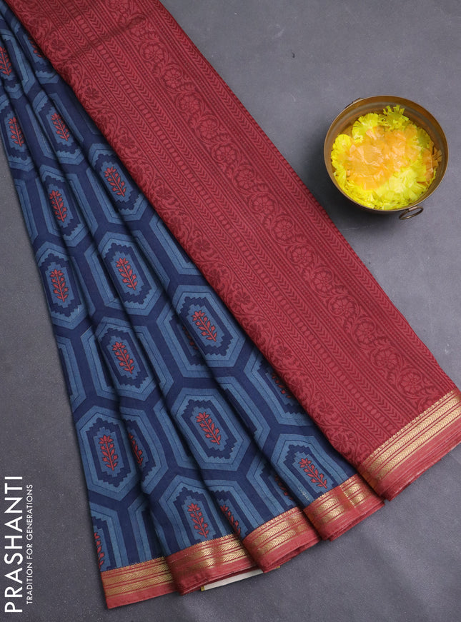 Muslin silk saree bluish grey and dark peach with allover geometric prints and zari woven border