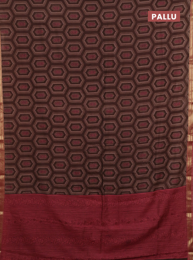 Muslin silk saree brown and dark peach with allover geometric prints and zari woven border