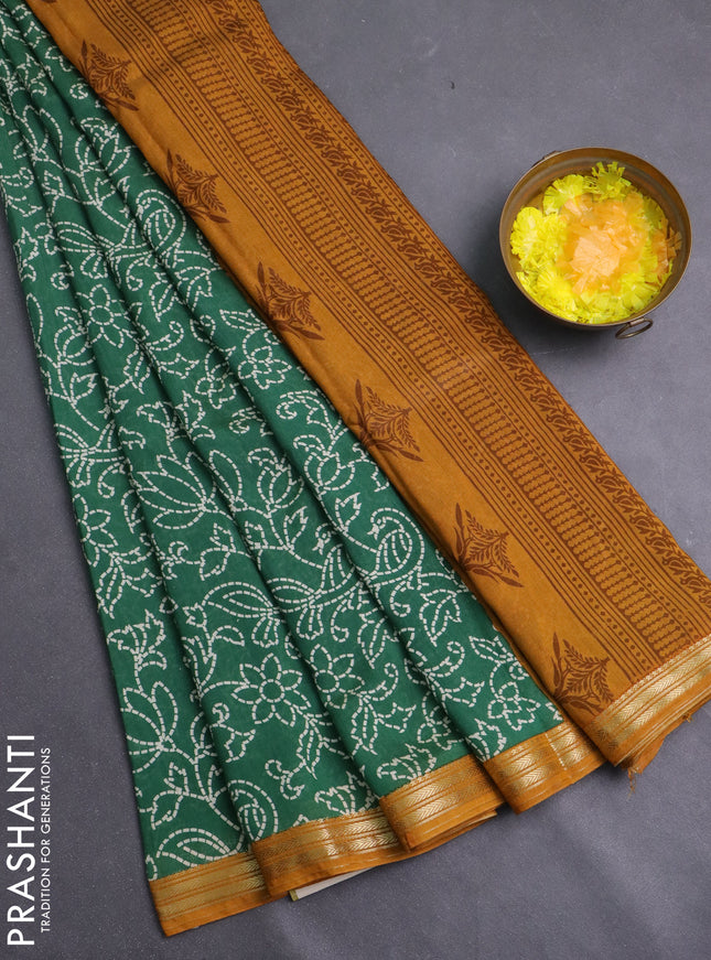 Muslin silk saree green and mustard yellow with allover prints and zari woven border