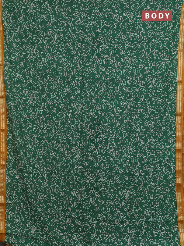 Muslin silk saree green and mustard yellow with allover prints and zari woven border